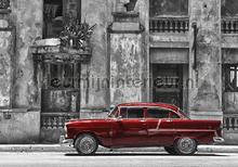 Red oldtimer in the city fotobehang Kleurmijninterieur Kinderkamer-jongens