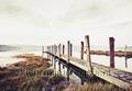 Wooden walkingbridge fotomurais Landscape Kleurmijninterieur